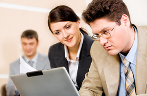 Recruiters looking at a resume